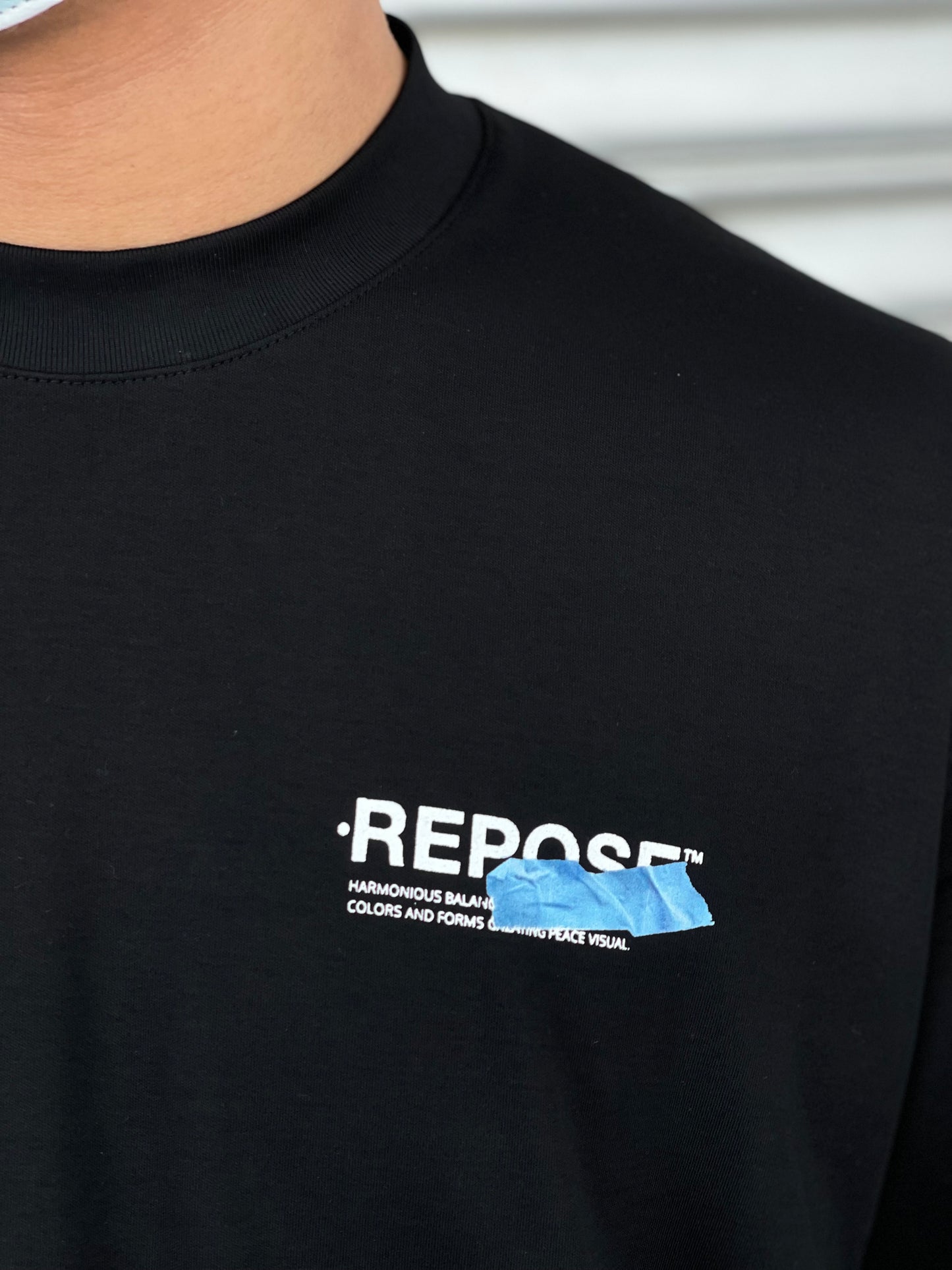 REPOSE PAPER TAPE LOGO