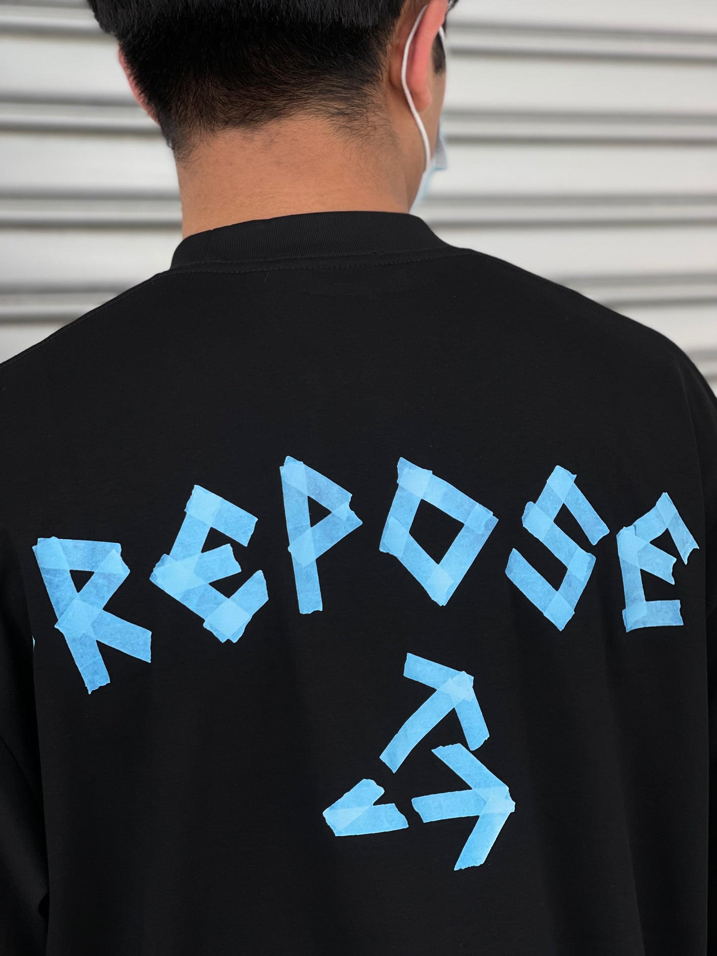 REPOSE PAPER TAPE LOGO